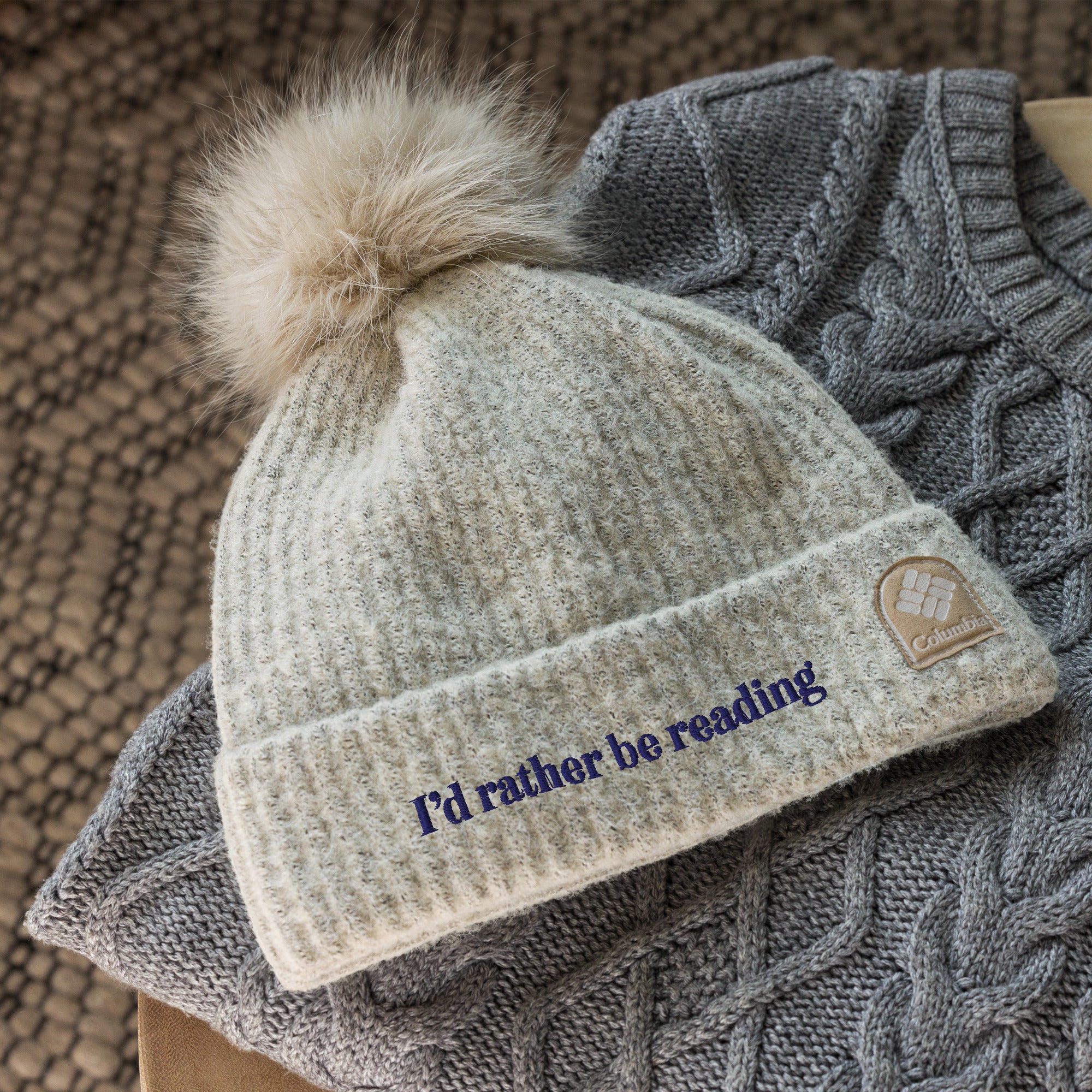 I’D RATHER BE READING Columbia pom-pom beanie
